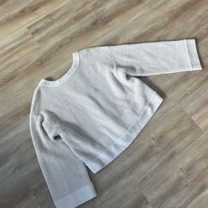 Nude knit sweater with tie back